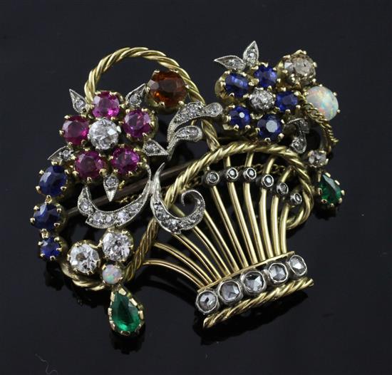 A 20th century yellow gold, platinum and multi gem set brooch modelled as a basket of flowers, width 40mm.